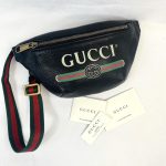 100% authentic Gucci black leather bumbag / waistbag with logo print